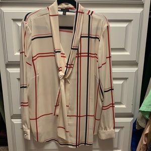Classic Ann Taylor blouse. Cream colored base, red and black accent striped